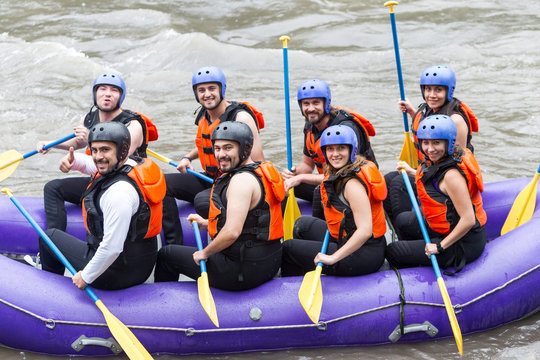 Group Of Mixed Young Tourists Striking A Pose Before Whitewater Rafting Trip Raft Sport Rafting Water White Team Flow Amazing Adventure River Challenge Teamwork Group Boat Helmet Rowing Whitewater Pe