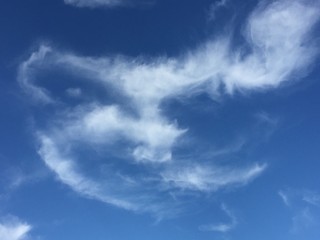 One eyed face in the clouds