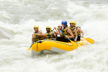 Fototapeta na wymiar A thrilling whitewater rafting adventure with a team of determined rowers conquering the wild rapids, creating an exhilarating and fun-filled action scene.