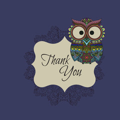 Ornamental owl on the patterned background.