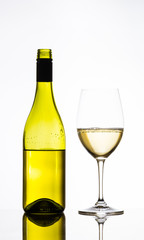wine glass and bottle of white wine
