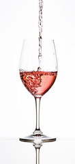 pouring Rose into wine glass