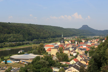 Fototapeta na wymiar Cityscape of Bad Schandau with river Elbe and mountain Lilienstein in Saxon Switzerland