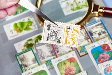 Fototapeta na wymiar Old postage stamps in album