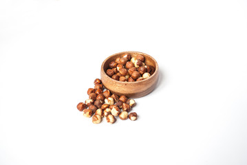 Hazelnuts in a Wooden Bowl on White Background