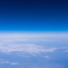 Fototapeta na wymiar skyline view above the clouds from air plane 