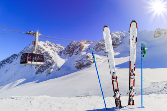 Winter season - ski equipments on ski run