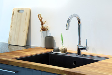 Modern sink with decoration in kitchen room