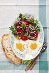 fried eggs and salad