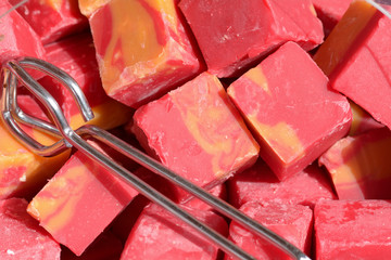 Bright colorful fudge for sale at market stall 