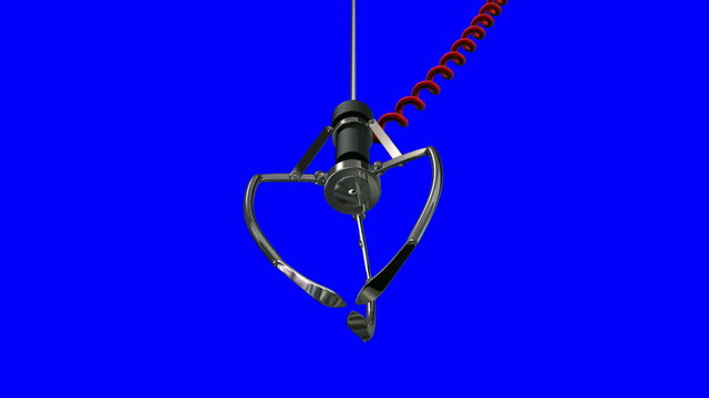 An arcade type robotic claw swinging across the camera and dipping down to pick something up on a blue screen background