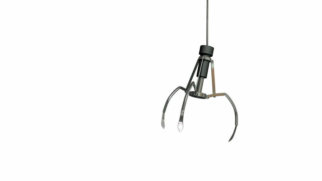 An arcade type robotic claw swinging across the camera and dipping down to pick something up on an isolated white background