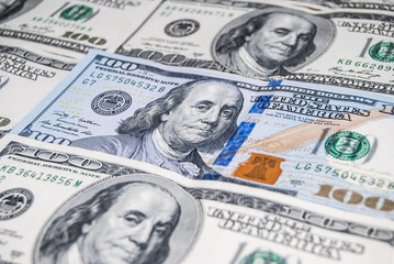 new and old 100 american dollar bills as background