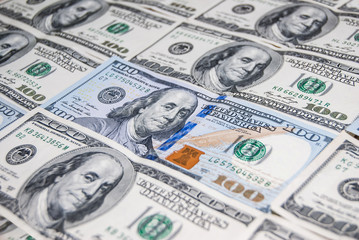 new and old 100 american dollar bills as background