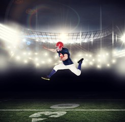 Fototapeta na wymiar Composite image of american football player jumping