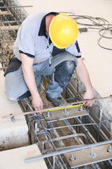 engineer measuring foundation