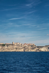 Fototapeta na wymiar Bonifacio in Corsica perched on white cliffs above the Mediterra