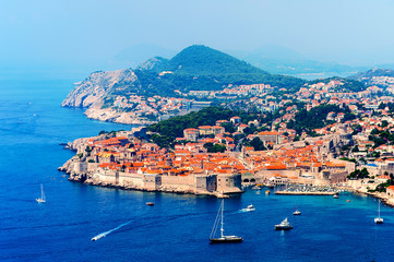 Fototapeta premium Panorama of Dubrovnik old city with many boats in front