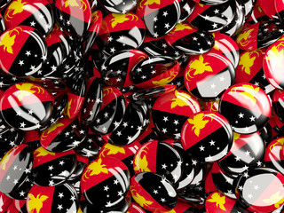 Background with round pins with flag of papua new guinea