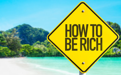 How to be Rich sign with beach background