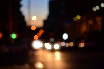 Evening city cars defocused lights background