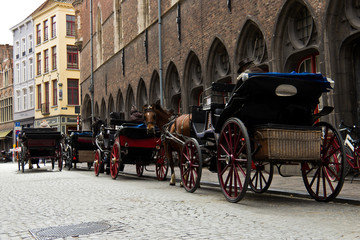 Horse-drawn buggy for tourists in Bruges, Belgium