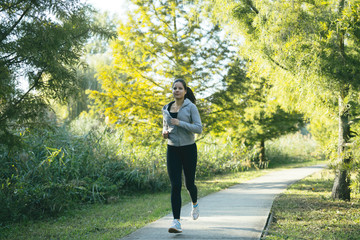 Woman running in park