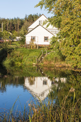 Obraz premium Landscape with a white house