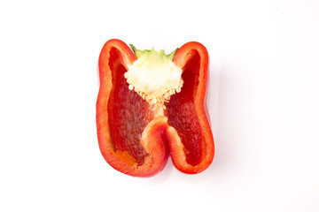Half red pepper isolated on white background..