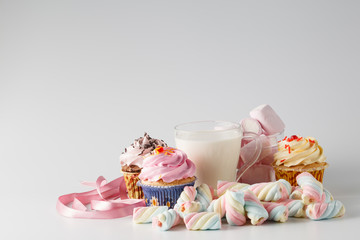 Heap of colored sweets on white background