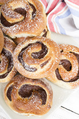 Homemade cream buns with chocolate