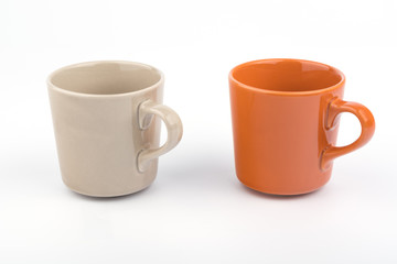 Orange offee cup and brown offee cup on white background