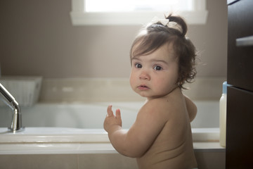 A Toddler in bathroom