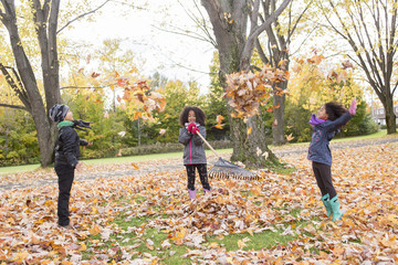 Childs on the leaf season. The autumn season