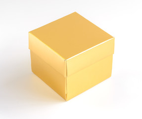 Gold gift box on white background
