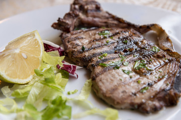 Grilled spadefish - traditional Calabrian dish.