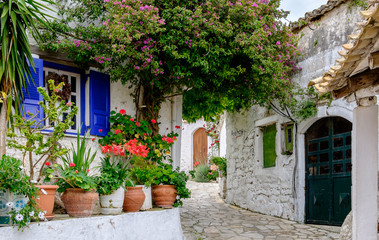 The Garden Village, Afionas, Corfu, Greece. - obrazy, fototapety, plakaty