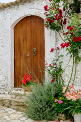 Fototapeta na wymiar An old beautiful door in Afionas village, Corfu, Greece.