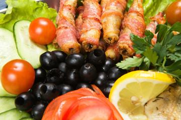 barbecue with sauce and vegetables