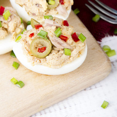 stuffed eggs with tuna, olives and paprica