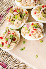 stuffed eggs with tuna, olives and paprica