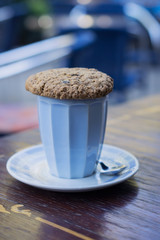 Сup of cappuccino with oat cookie