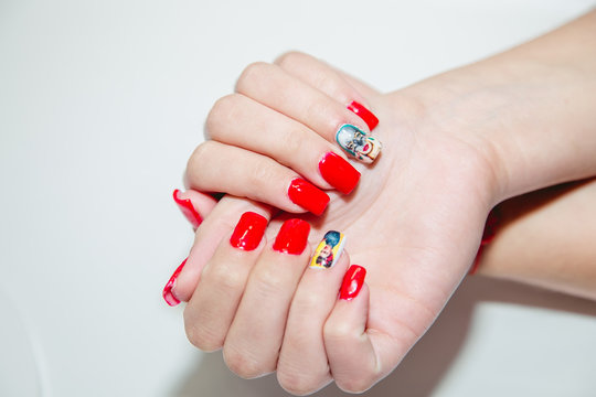 Red manicure, women handle