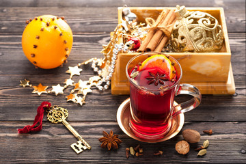 Christmas mulled wine and Christmas tree toys . Horizontal