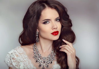 Portrait of a beautiful fashion bride girl with sensual red lips