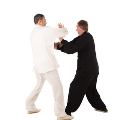 Two karate fighters. Training fight.