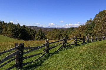 Mountains and Meadows with Split Rail Fences