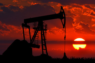 Oil Pump on red sunset