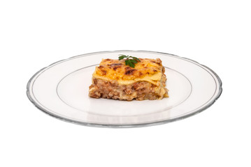 Portion of lasagna with meat isolated on plate