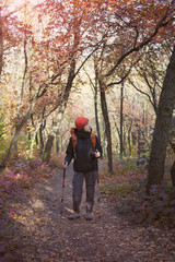 Fototapeta premium The girl with the backpack.